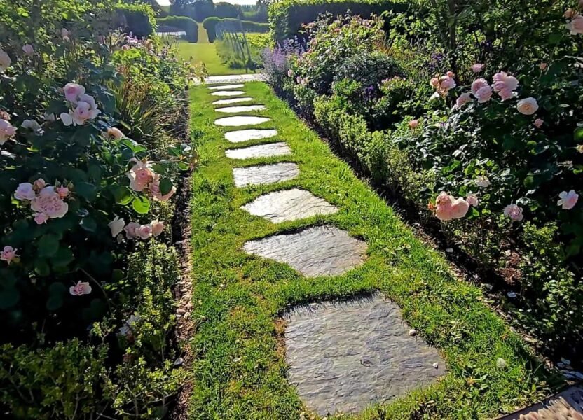 Brickhouse flower beds blooming in the sun