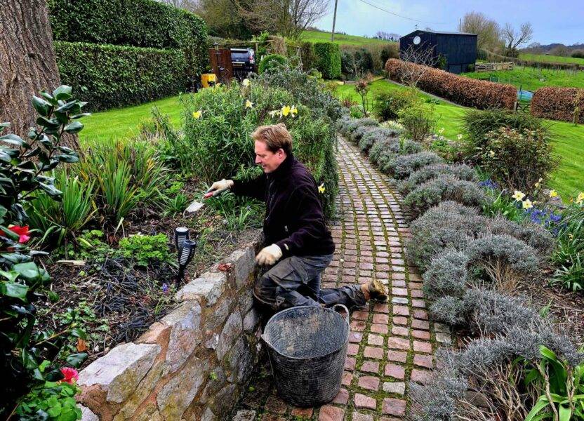 Dan working on a raised flower bed